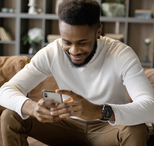 man texting on mobile phone